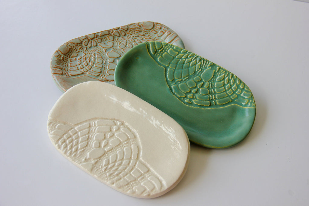 Ceramic soap dishes set, cream and teal green with glossy textured leaf pattern