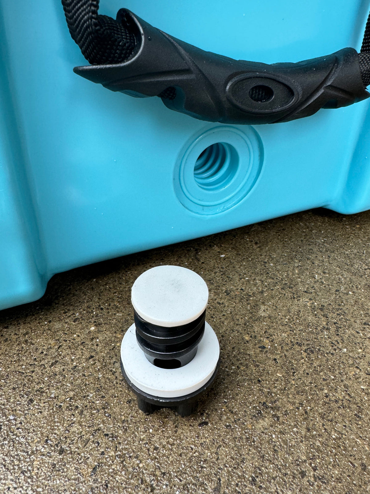 Caribbean blue hard cooler with drain fitting and white screw-on cap