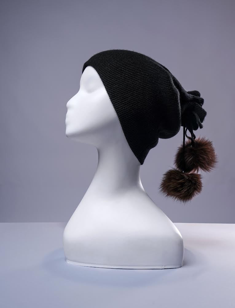 Black cashmere neck warmer and beanie with fur pom-pom detail
