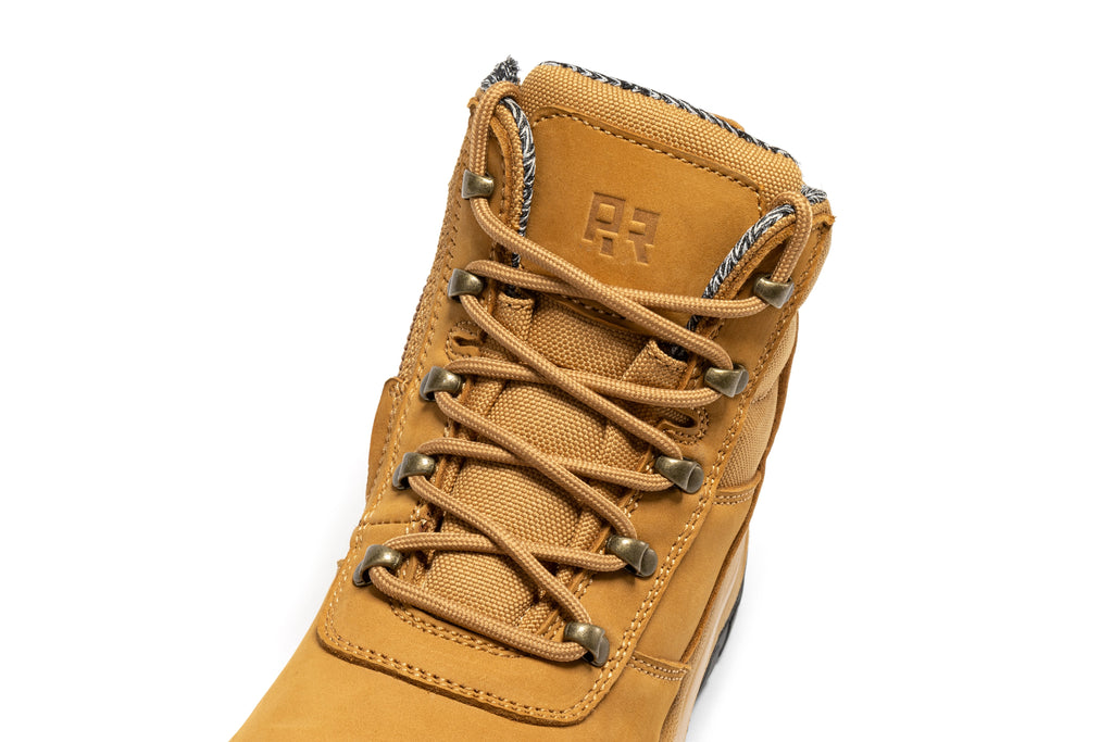 Wheat composite-toe boot upper close-up with laces, eyelets, and RR emblem