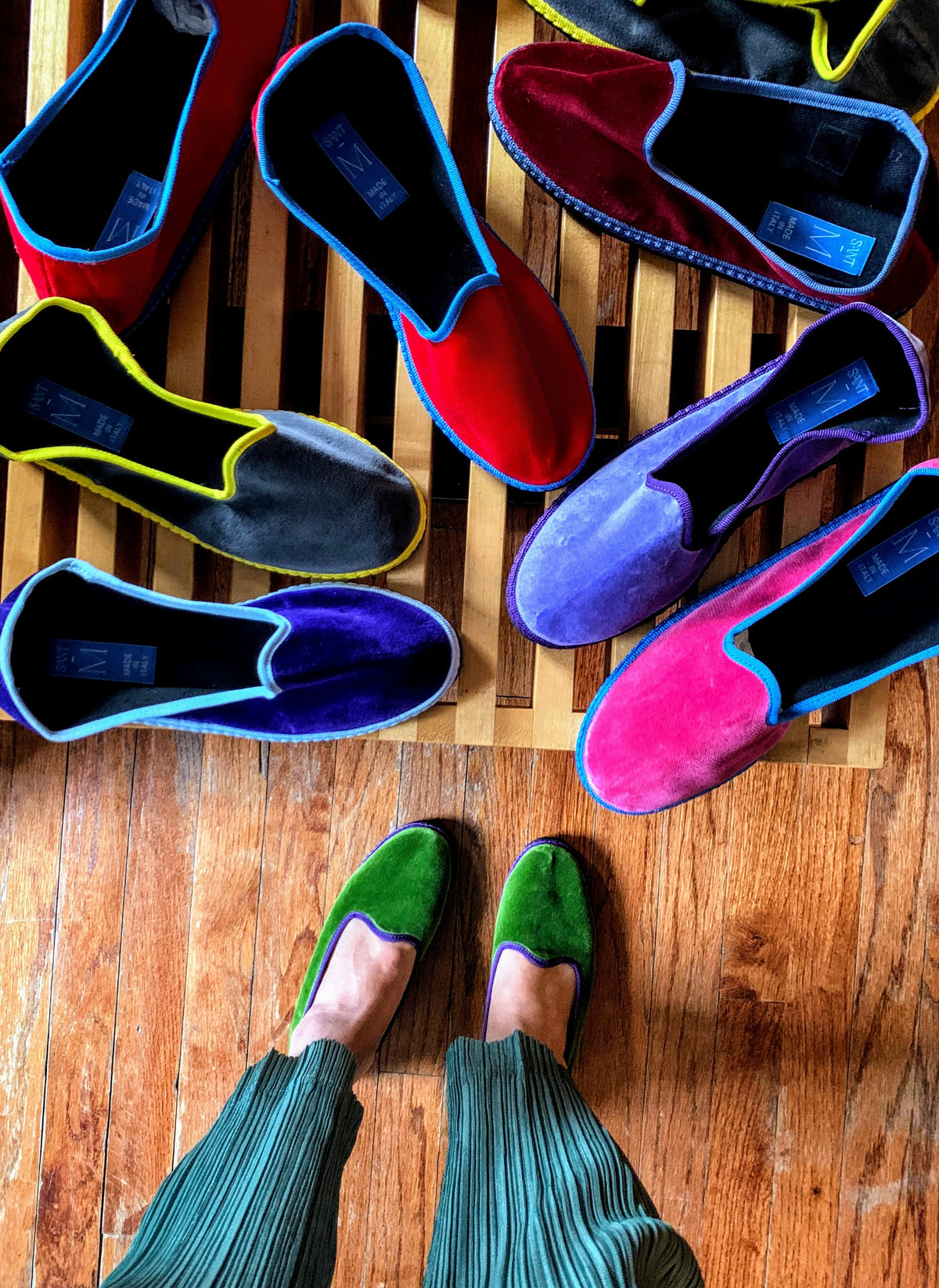 Furlane unisex slip-on shoes display on a wooden surface