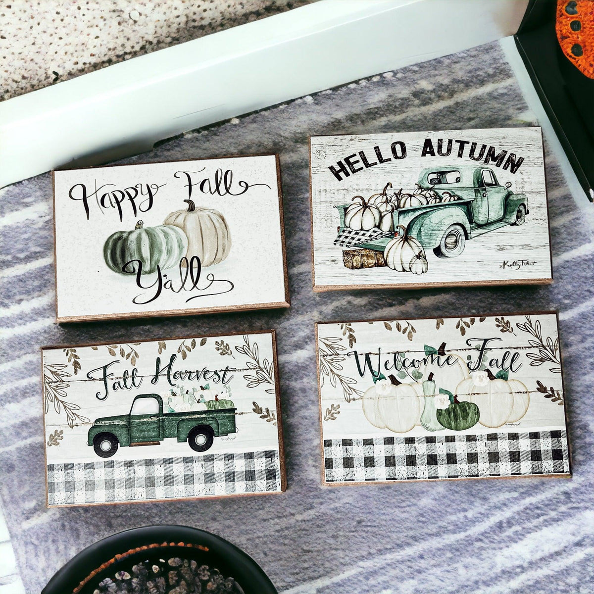 Four fall greeting cards featuring pumpkins and green truck artwork