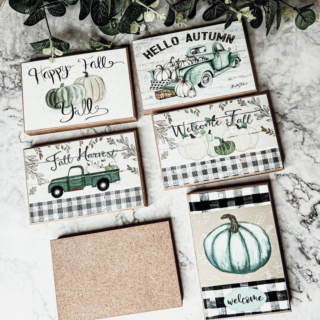 Fall greeting cards with green truck, pumpkins, plaid, and “Welcome Fall” message