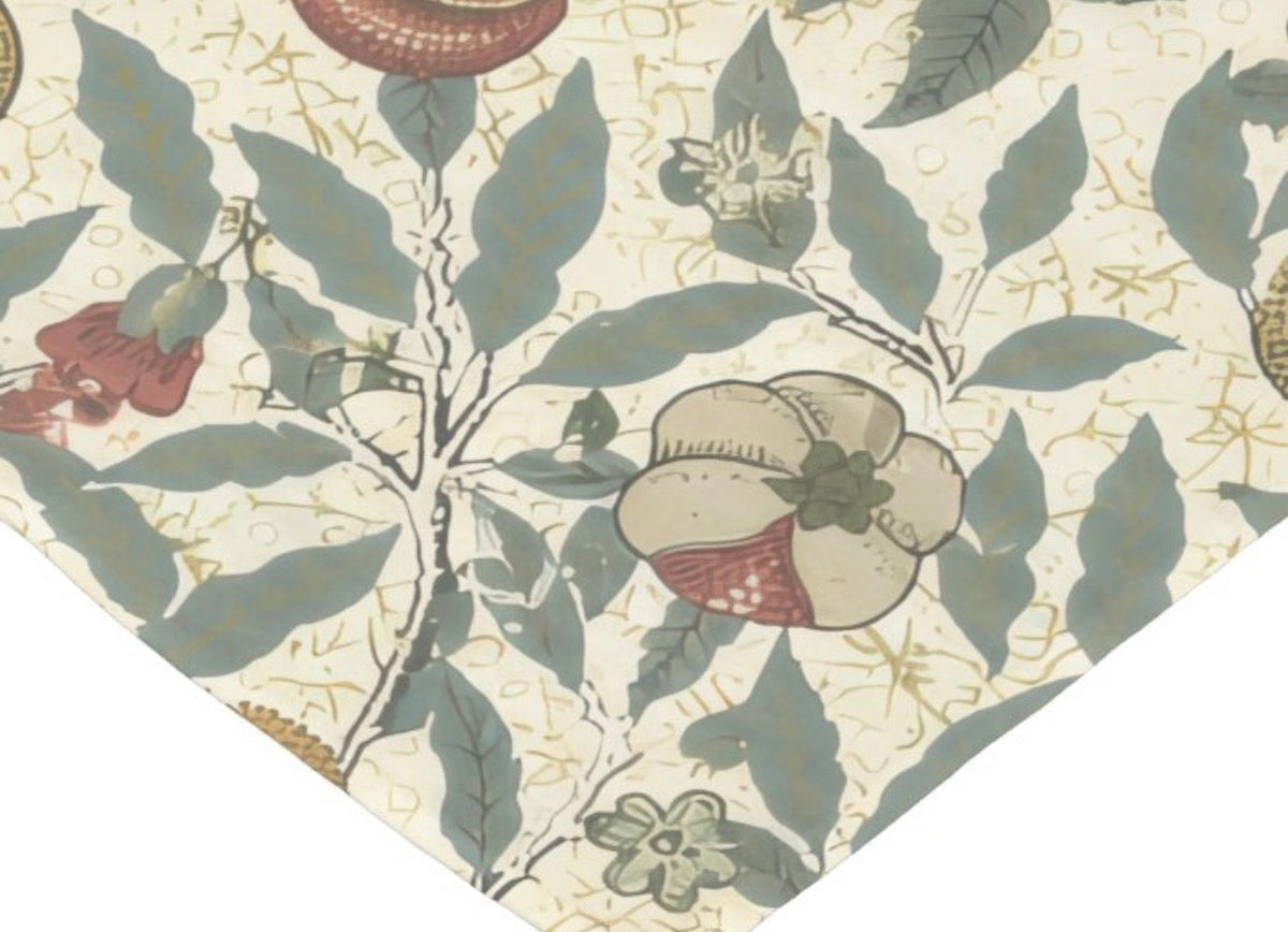 Botanical fruit bed pillow with leaf, berry, and flower pattern