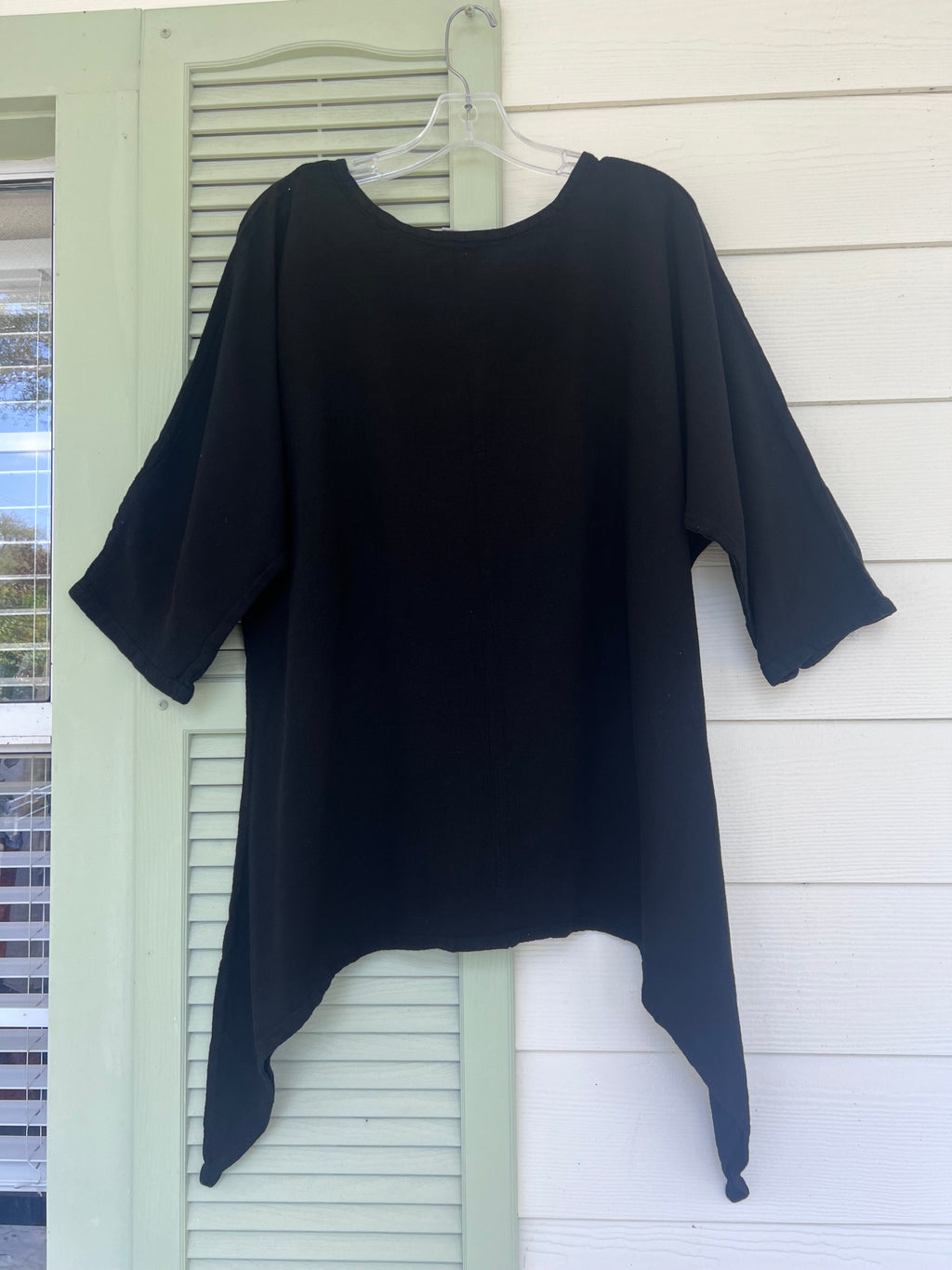 Women's cotton gauze Angela top in dark navy/black with asymmetrical hem and loose fit