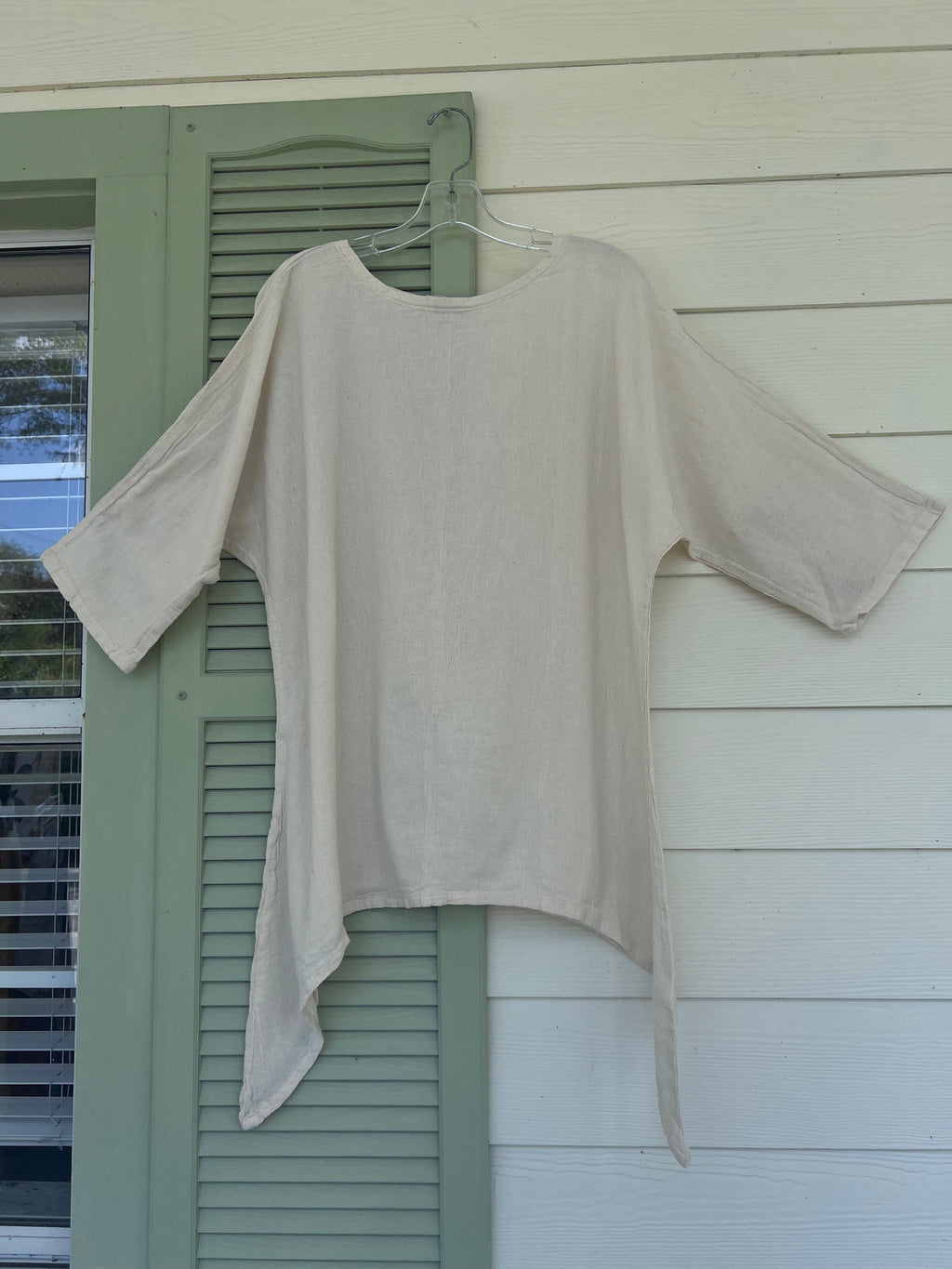 Women's cotton gauze Angela top in ivory/cream with asymmetrical hem and wide sleeves