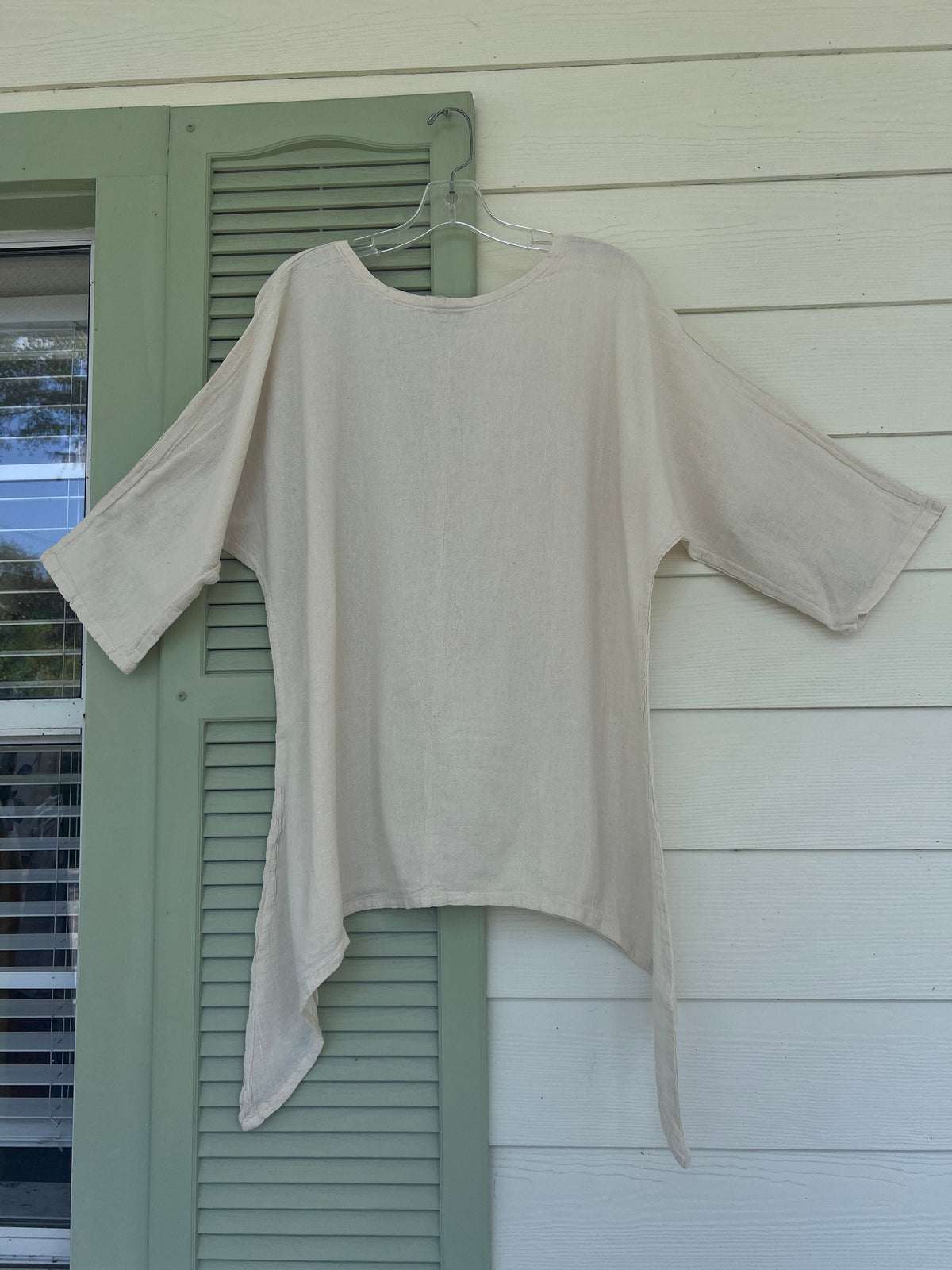 Women's cotton gauze Angela top in ivory/cream with asymmetrical hem and wide sleeves