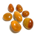 Orange aventurine tumbled stones, smooth glossy teardrop and oval shapes