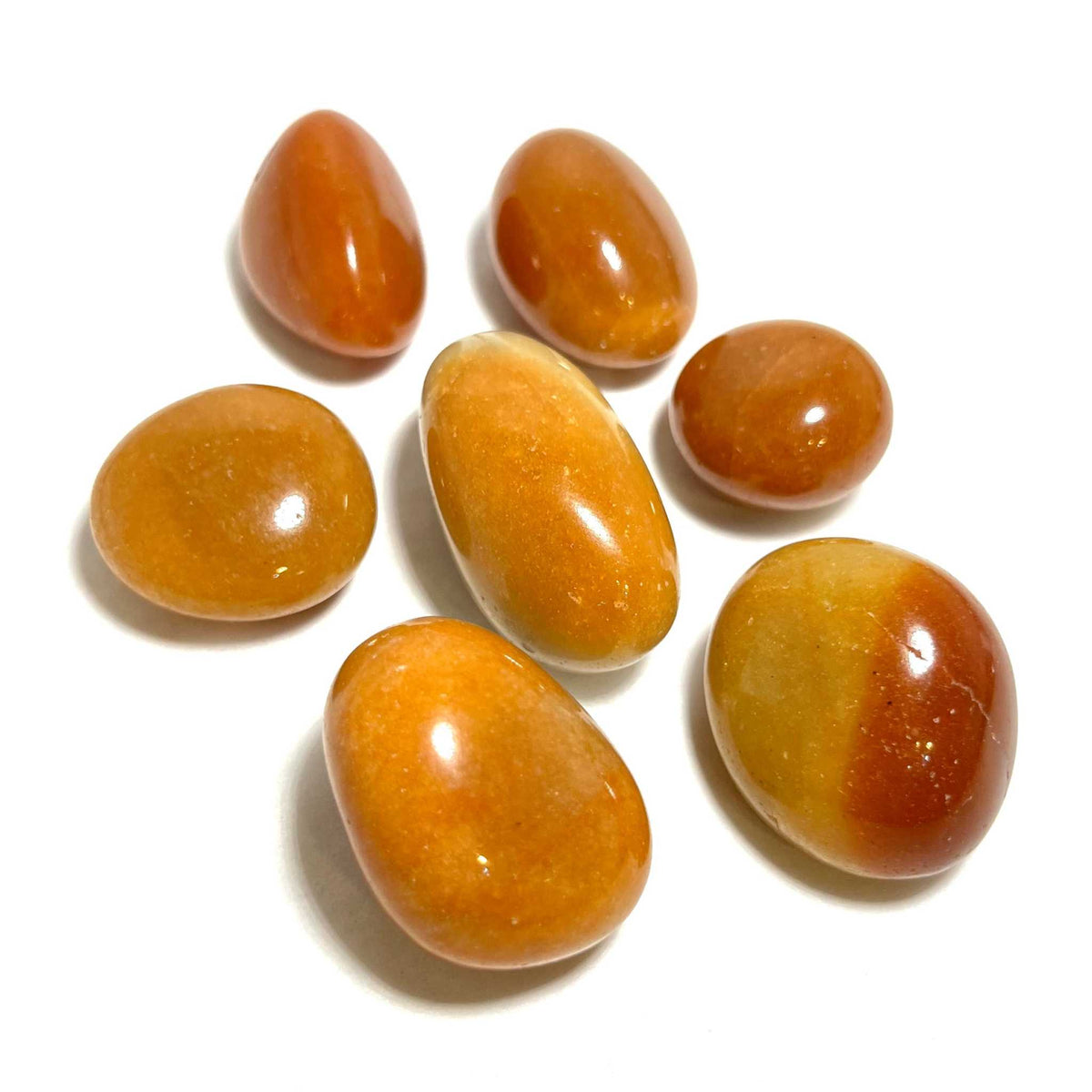 Orange aventurine tumbled stones, smooth glossy teardrop and oval shapes