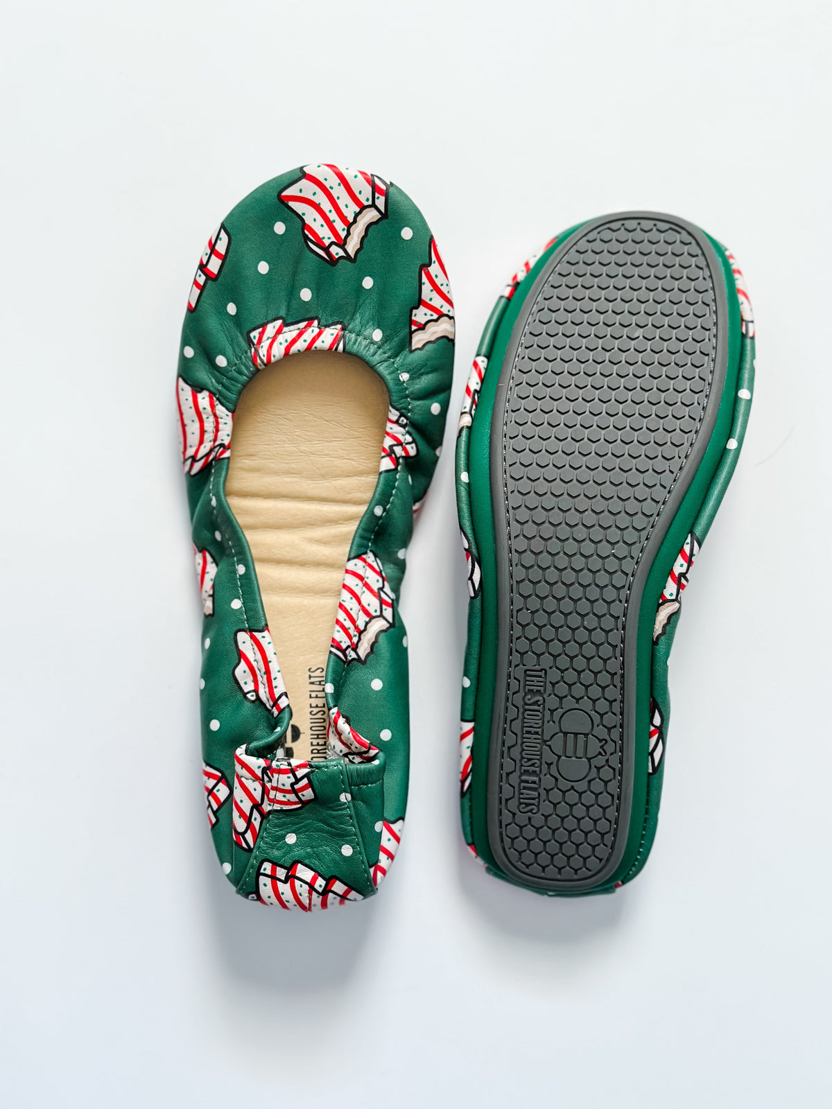 Green slip-on shoes with candy cane pattern; textured rubber outsole and heel