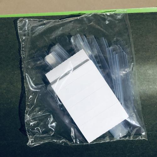 Bagged adjustable tab inserts and dividers for hanging file folders