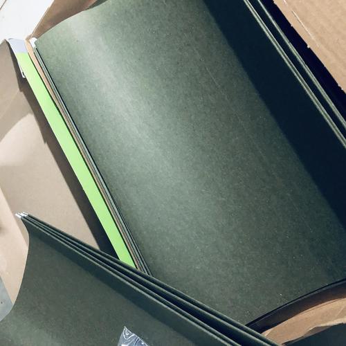 Inside box view of dark green legal hanging file folders with metal hang tabs