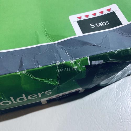 Top of Office Depot box with 5-tab label and creased plastic wrap
