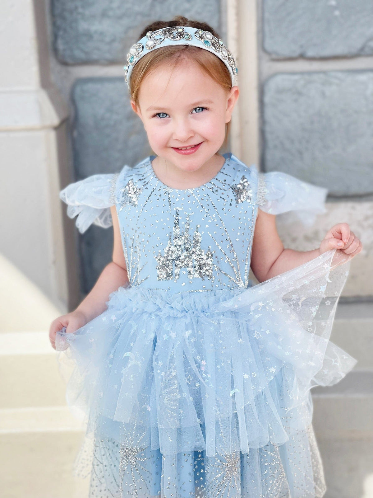 Girls light blue sequin tulle dress with flutter sleeves and sparkly neckline