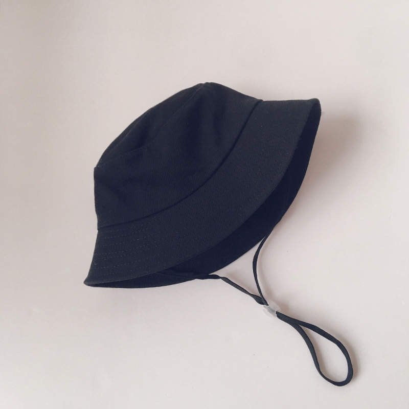 Dark navy kids linen fisherman bucket hat with wide brim and adjustable chin strap