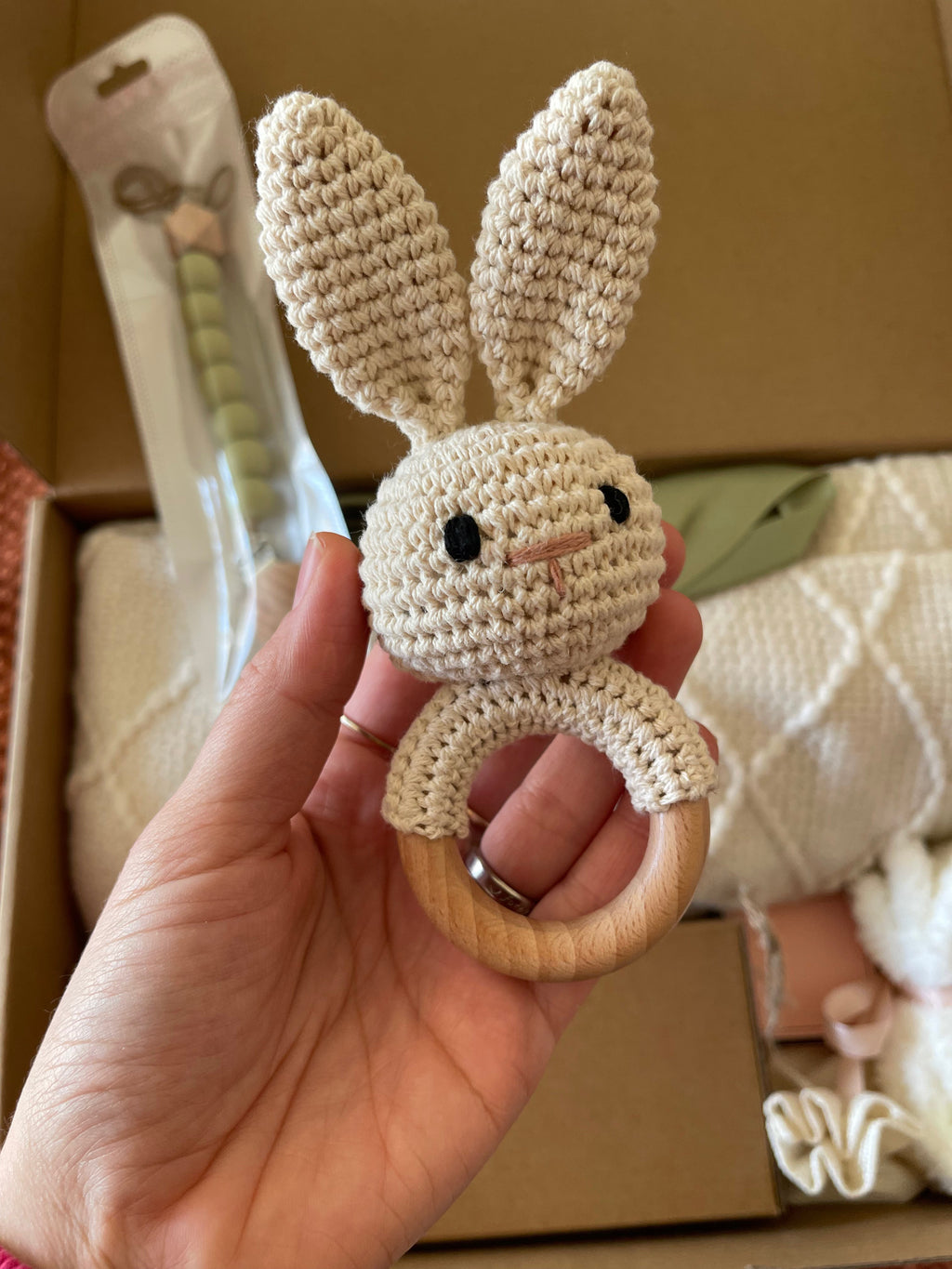 Crochet bunny teether with beige knit ears and small face details