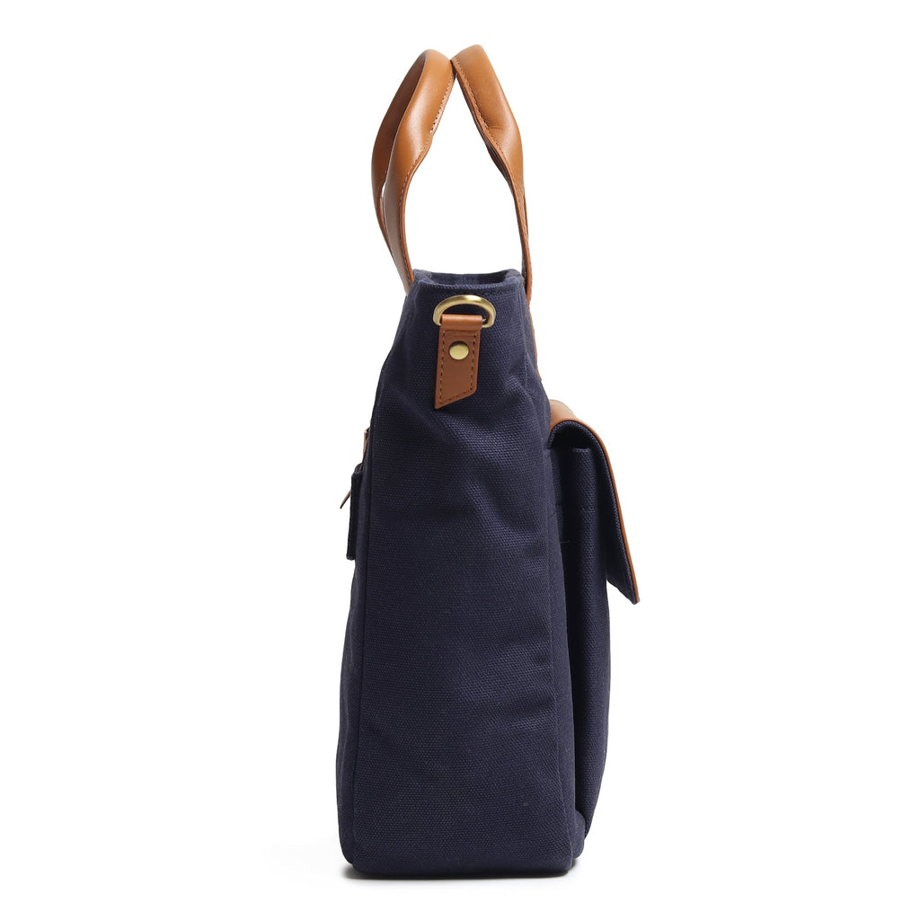 Navy canvas briefcase with tan leather top handle and zip pocket