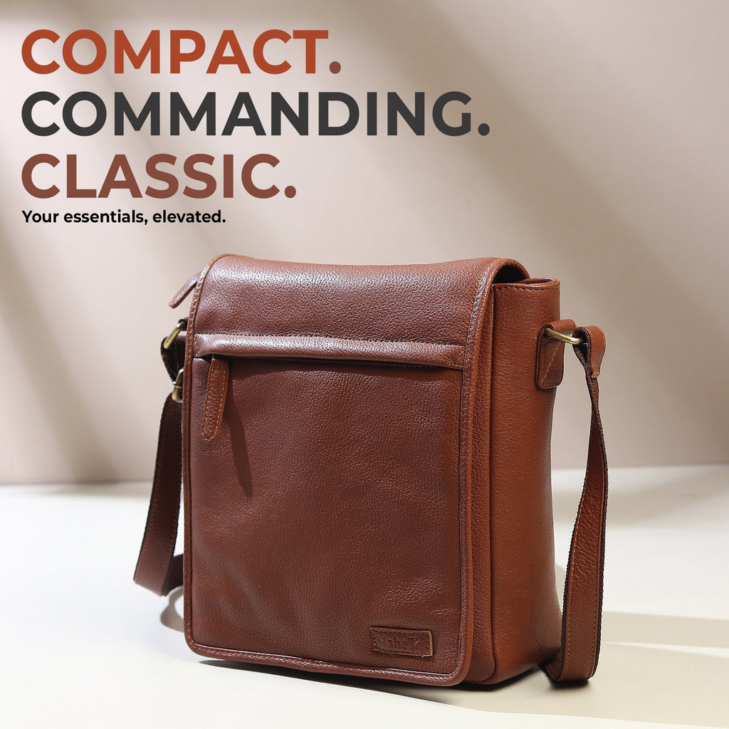Brown leather crossbody bag with flap front and two side buckles