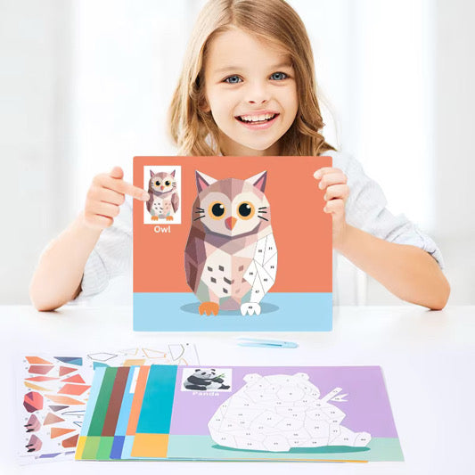 Kids sticker puzzle painting kit showing an owl character card held up by a child