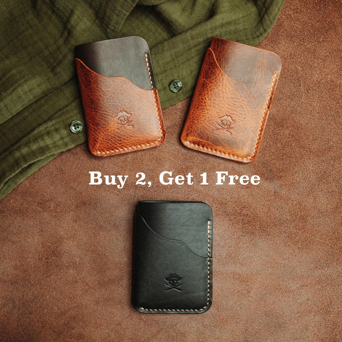 Set of leather card wallets in black and tan, embossed emblem, metal snap