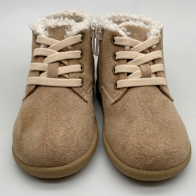 Tan toddler winter barefoot boots shown front view with side zipper and sherpa lining
