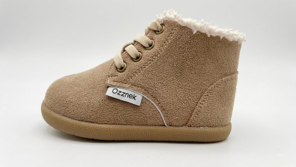 Tan toddler winter barefoot boots with lace-up closure and fuzzy sherpa lining