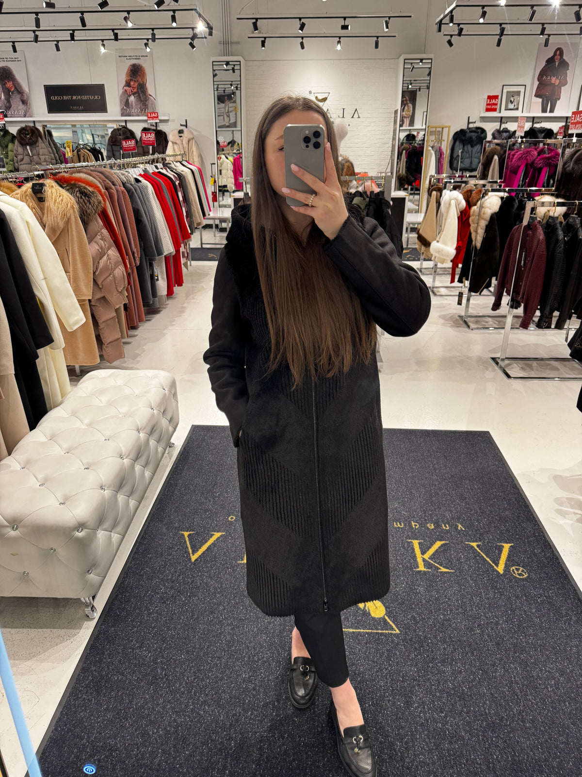 Black hooded reversible coat with faux fur texture and long front zipper