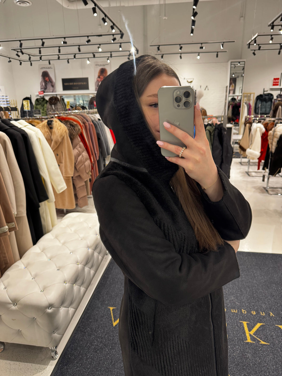 Black reversible faux fur hooded coat with long zipper and full hood