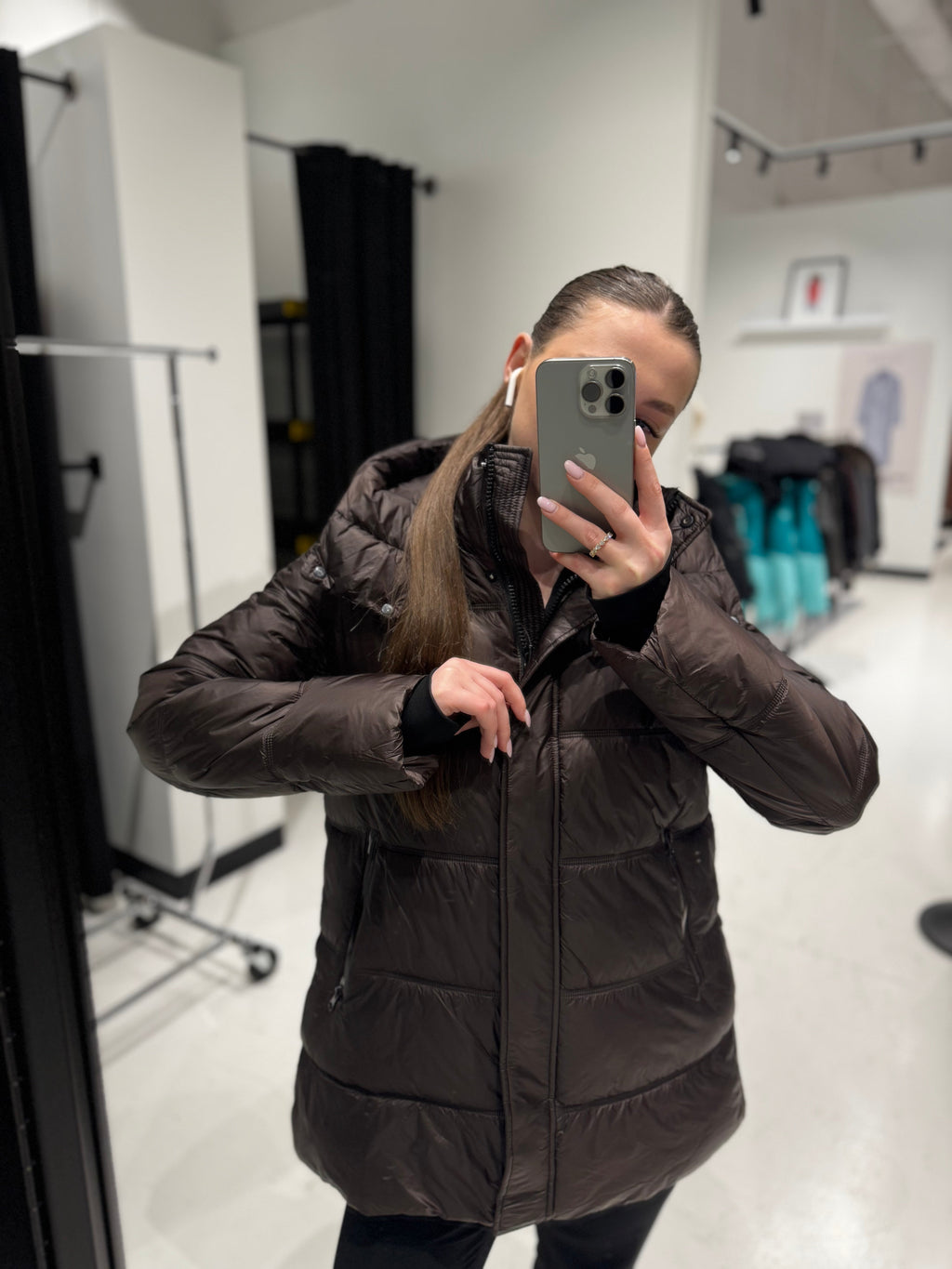 Chocolate hooded quilted puffer jacket with front zipper and relaxed fit