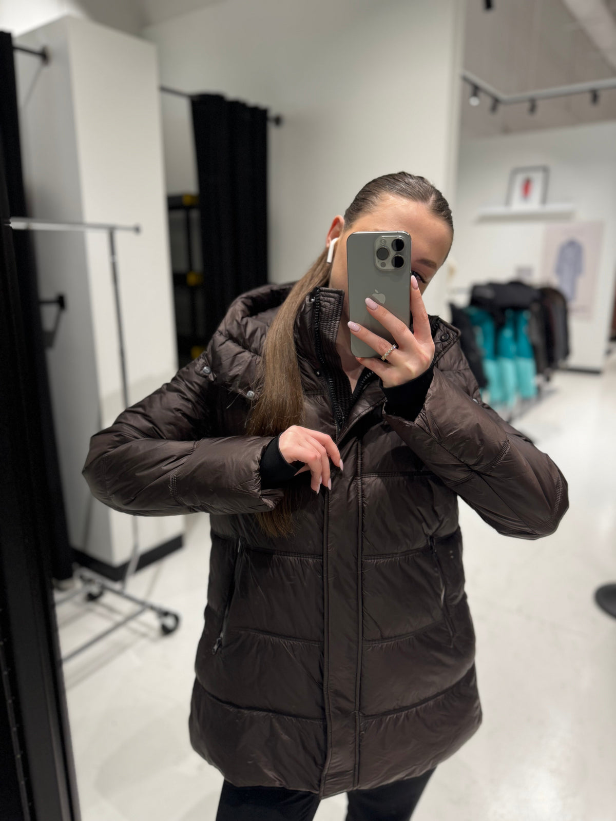 Chocolate hooded quilted puffer jacket with front zipper and relaxed fit