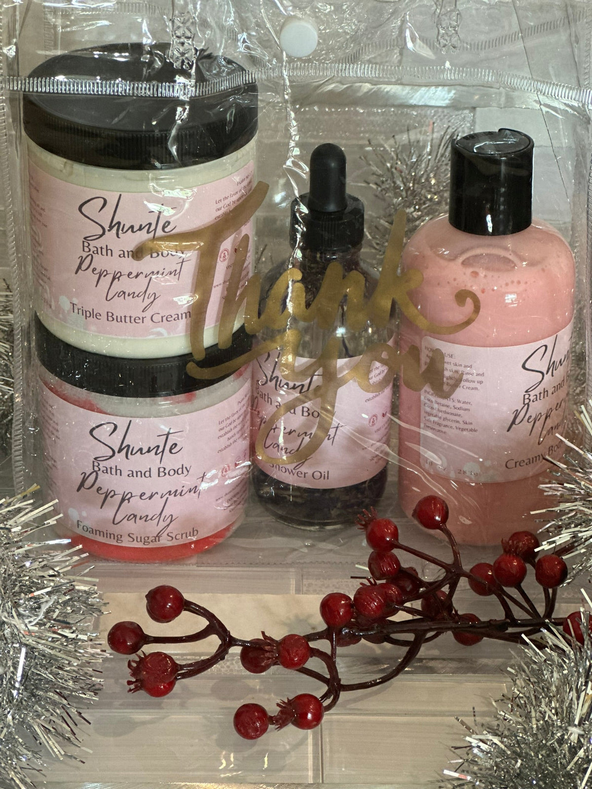 Bath and body gift set (4 items): pink and black jars, dropper oil, pink pump bottle