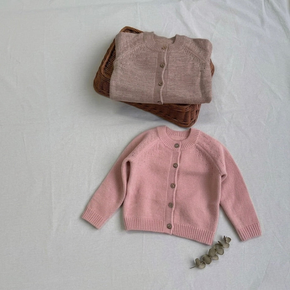 Kids' organic cotton cardigans, taupe and blush pink, folded with button fronts