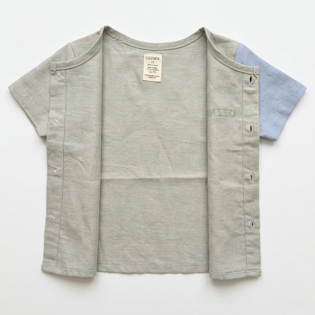 Toddler button-up shirt back view, sage chambray gray-green and blue side panels