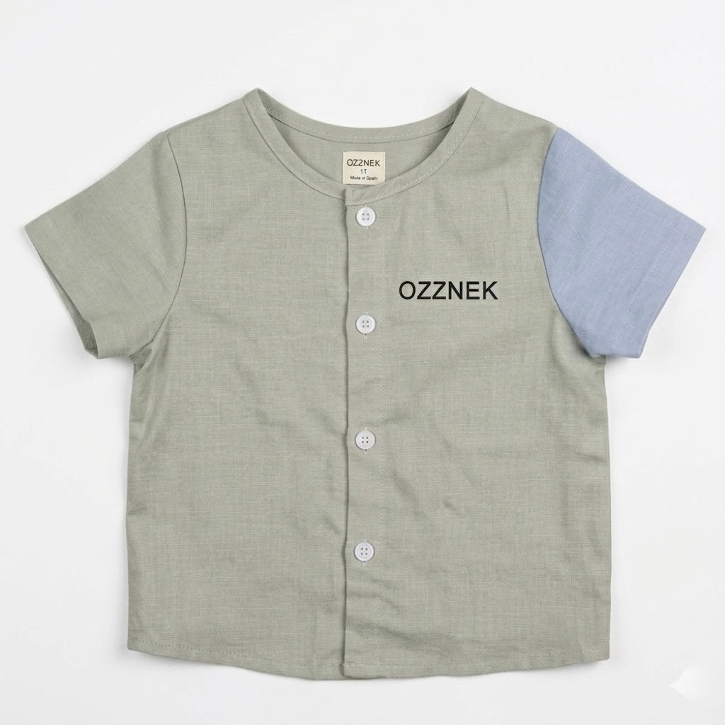Toddler linen button-up shirt front view, sage green with blue side sleeves; OZZNEK
