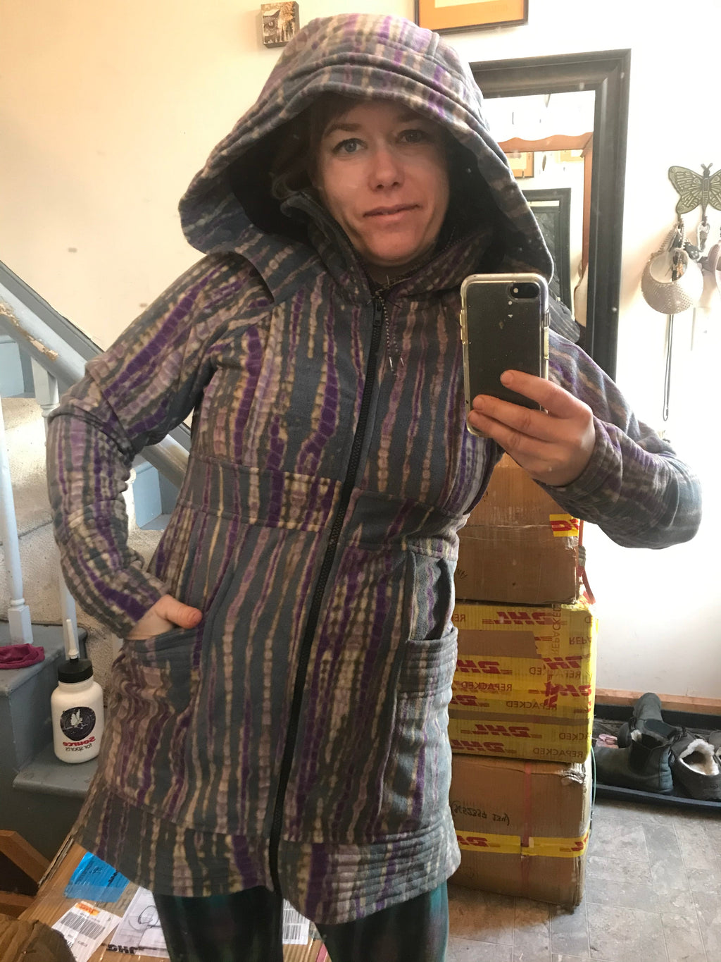 Multicolor striped fleece hooded jacket with full zipper, front pockets, and long sleeves