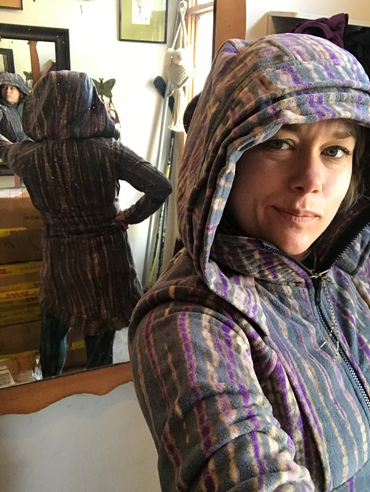 Multicolor striped fleece hooded jacket with high neck and full zip front