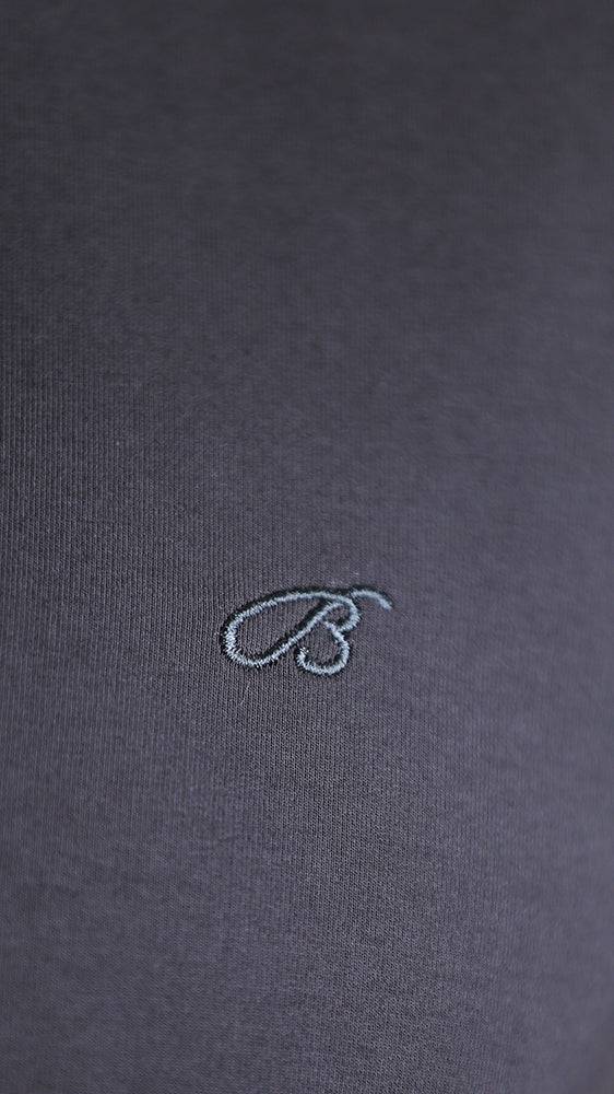 Grey polo shirt with small chest logo