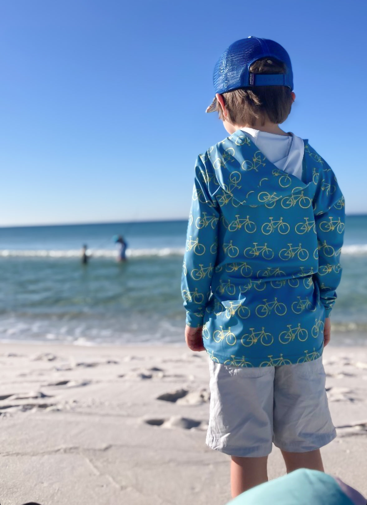 Kids blue patterned sun hoodie with hood, long sleeves, UPF 50