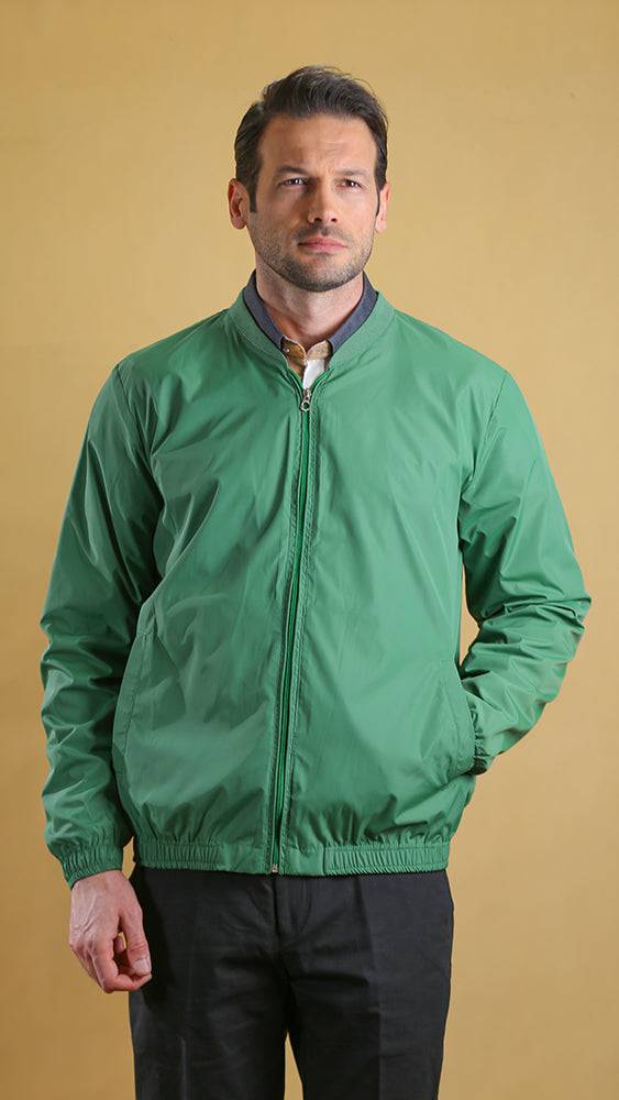 Green lightweight zip-front jacket with ribbed cuffs and elastic hem