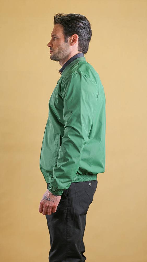 Green lightweight jacket with full-zip front and ribbed elastic cuffs