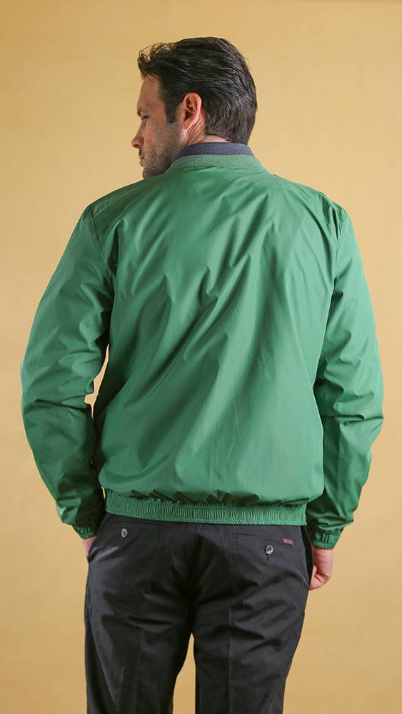 Green lightweight jacket back view with elastic hem and ribbed cuffs