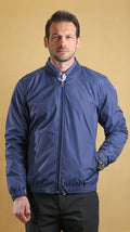 Lightweight spring jacket in dark blue with full-zip front and ribbed cuffs