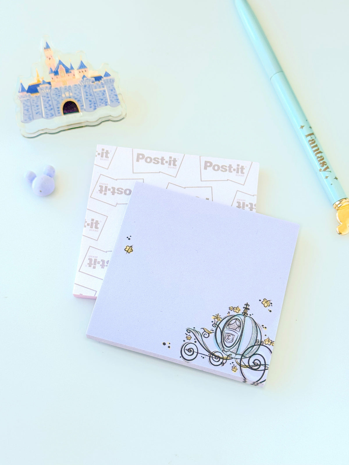 Set of pastel sticky notes featuring princess carriage sketch and Post-it tab notes.