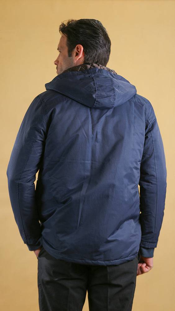 Navy bomber jacket with hood, back view, and ribbed cuffs
