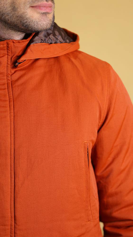 Orange bomber jacket hood and high collar detail