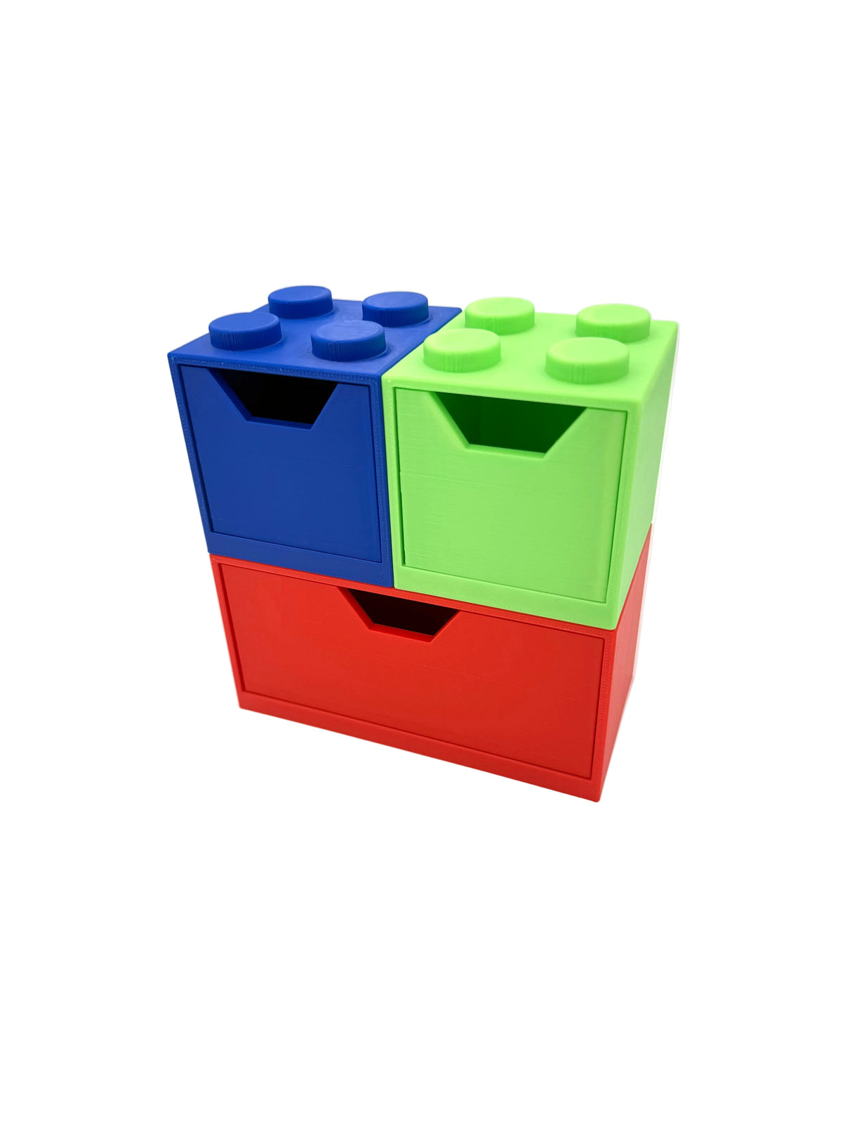 Block-style desk organizer with blue, green, and red drawer bins and top studs