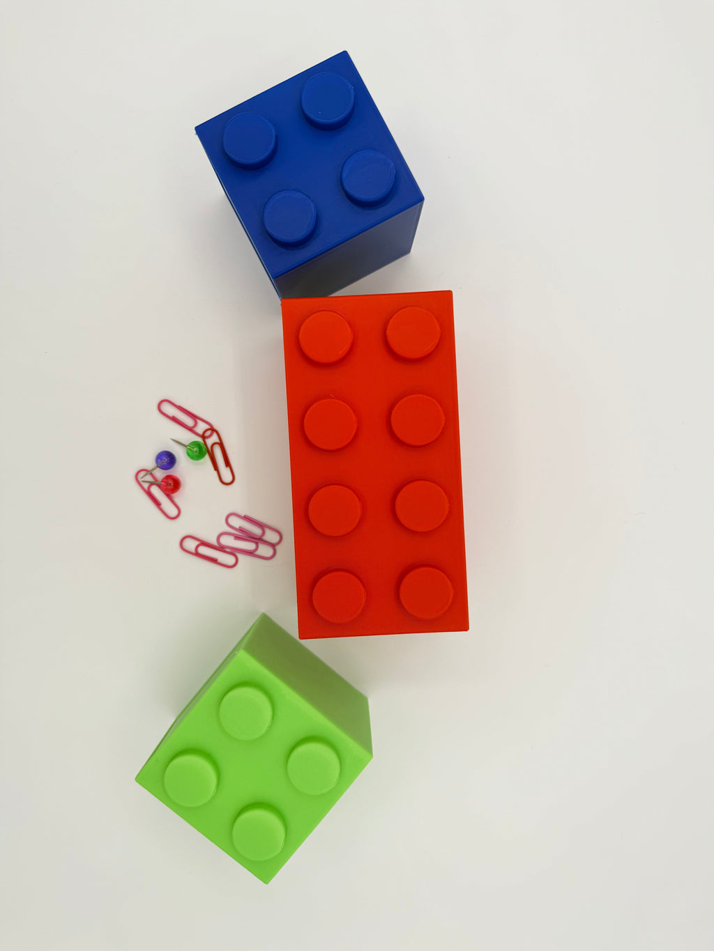 Stackable block desk organizer with blue, red, and green block compartments