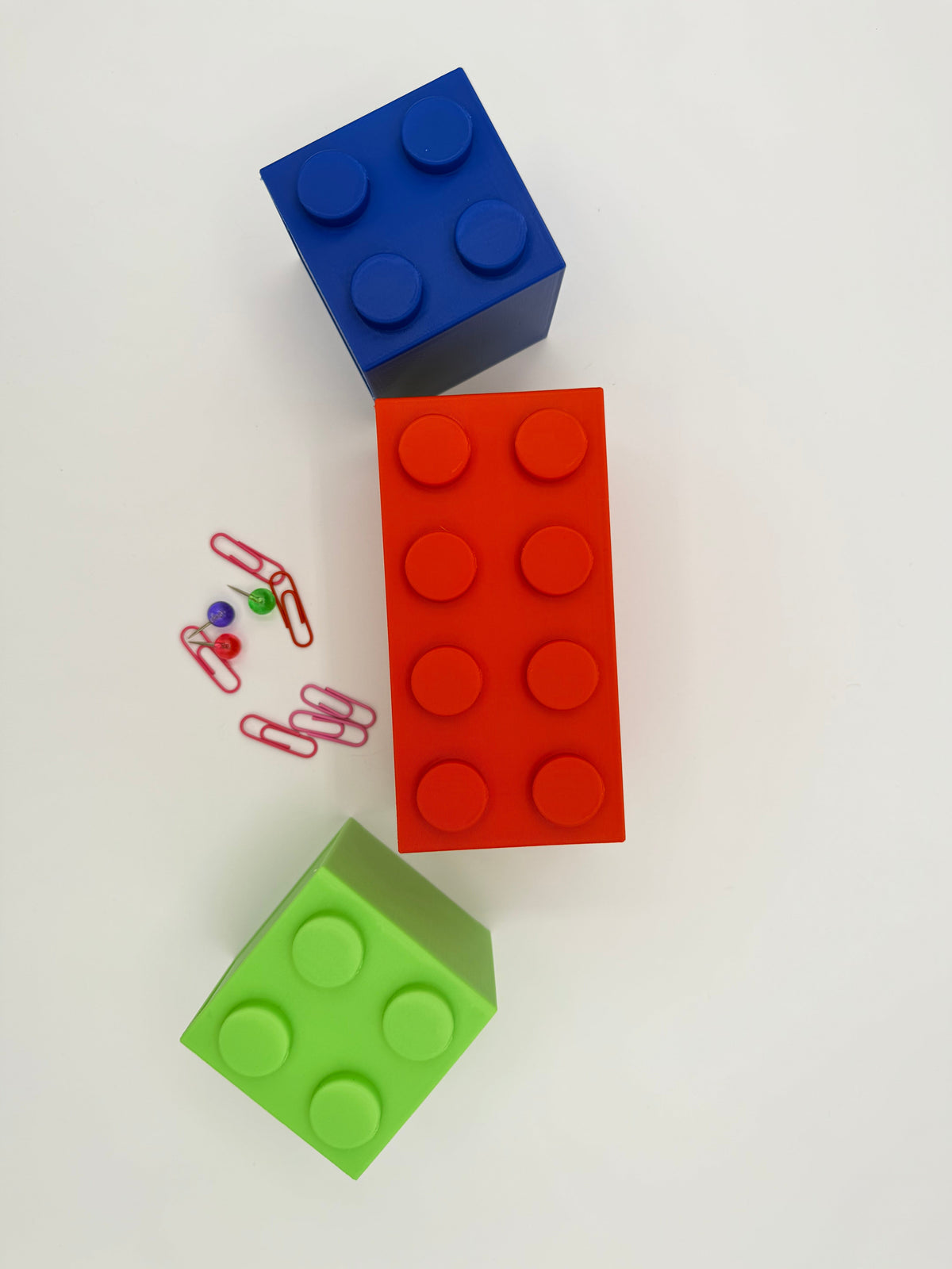 Stackable block desk organizer with blue, red, and green block compartments