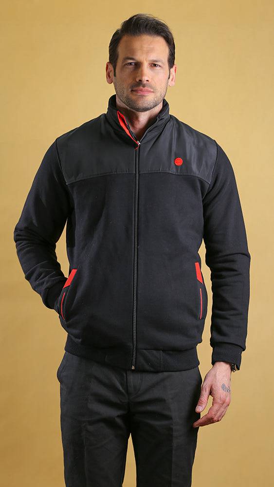 Black tech sweater with quarter-panel zip front, mock neck, and red accents