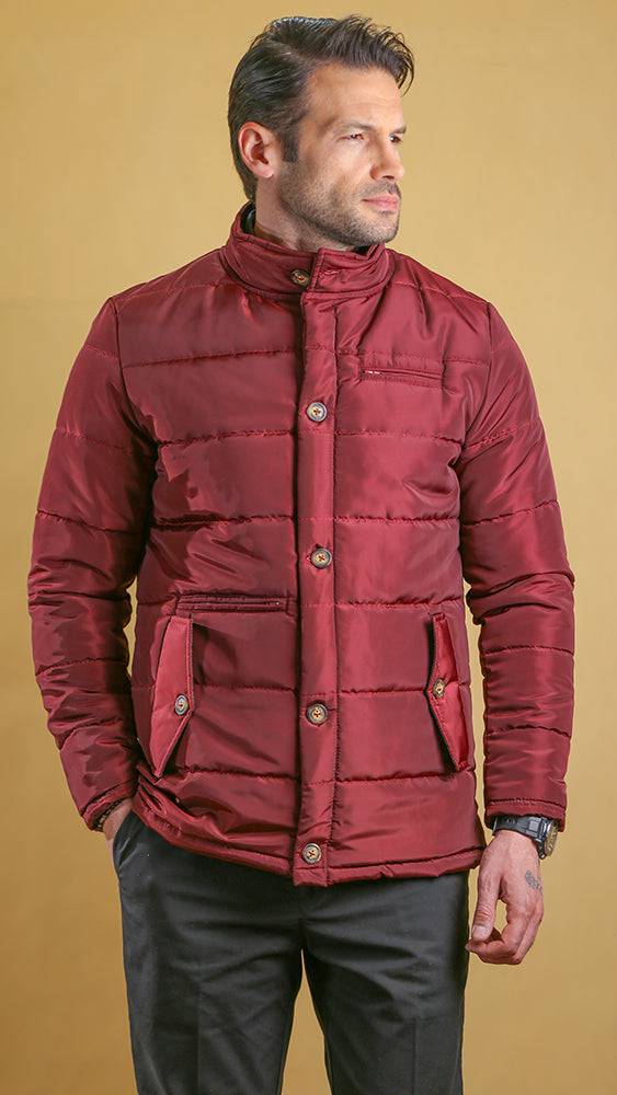 Crimson quilted bomber jacket with high neck, snap front, flap pockets, ribbed hem